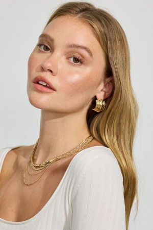 Women Garage Lined Curve Button Earrings Gold | A-2013769